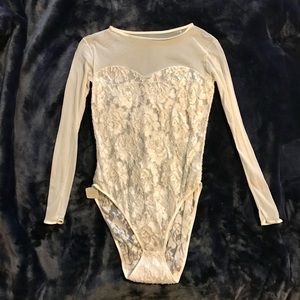 NWT Vintage Victoria’s Secret cream bodysuit. Gold label. Size: Medium